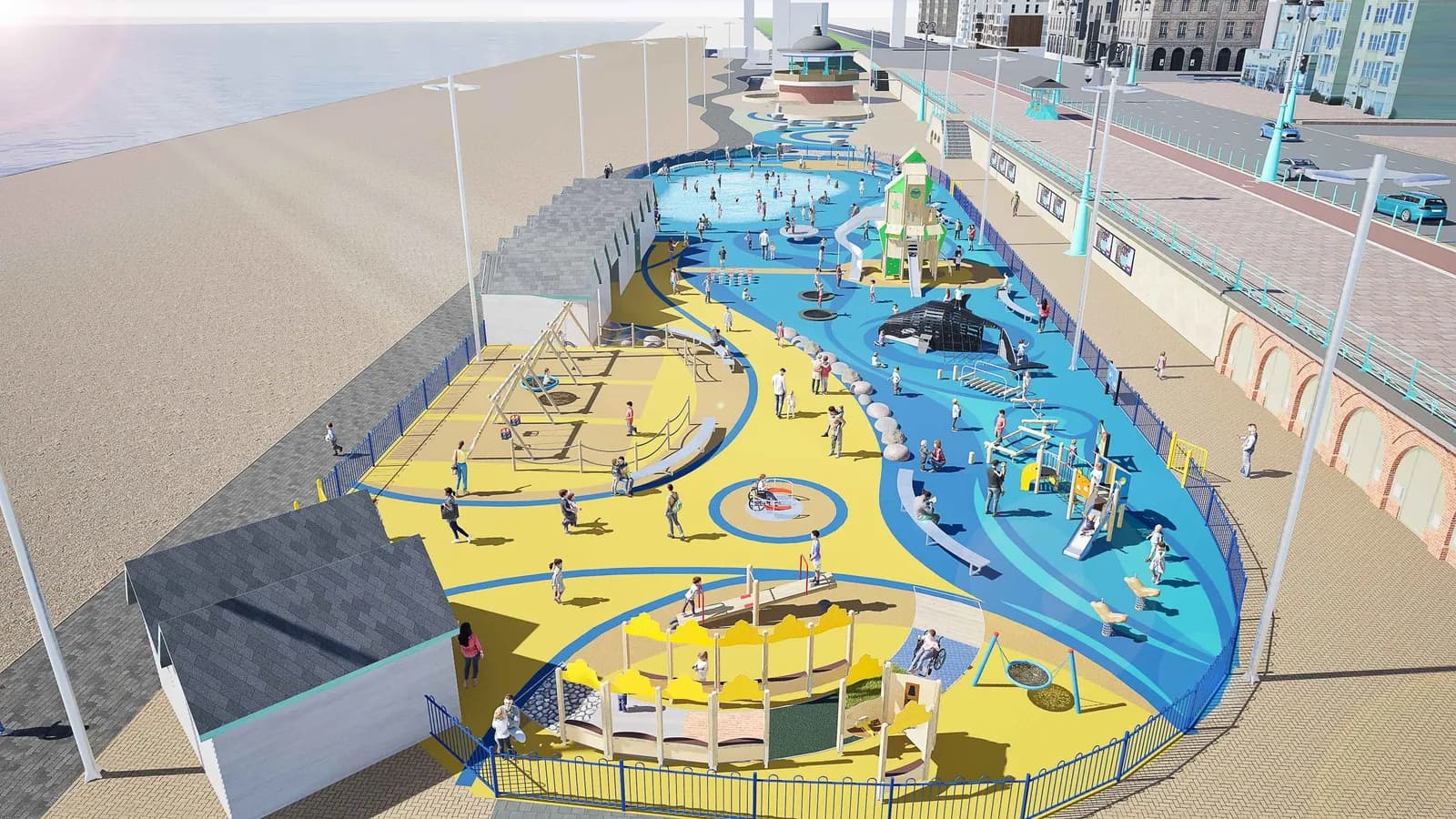 An aerial render of a large, vibrant outdoor play area on a sandy beach next to a promenade with buildings in the background.